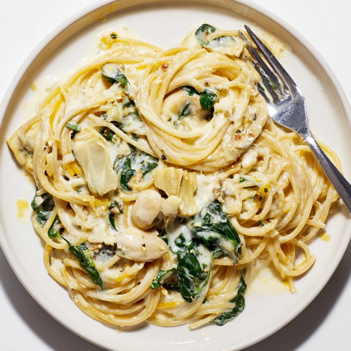 Comfort food: Creamy Spinach Artichoke Spaghetti plated, ready for a quick weeknight supper.