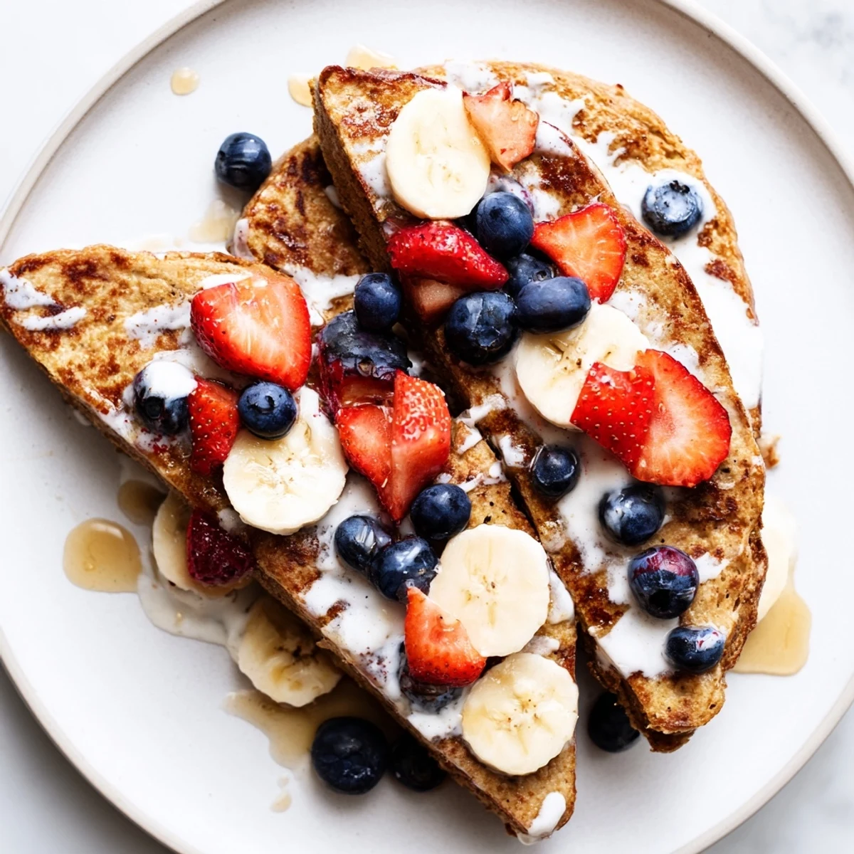 Warm, custardy protein French toast, cooked to perfection, showcasing a satisfying breakfast plate.