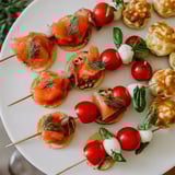 This colorful Magical Moments Happy New Year 2026 Platter displays irresistible appetizers and elegant treats.