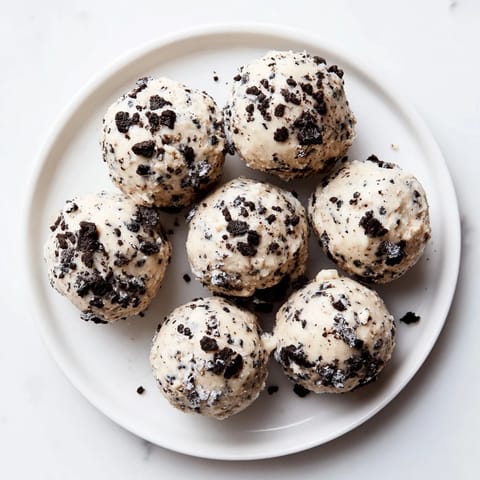These delicious Cream Cheese Oreo Protein Balls offer a delightful blend of cookie and cream, perfect for post-workout.