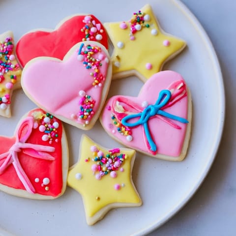 Adorable Pretty Bows Heart & Star Cookies, freshly baked, with a sweet vanilla aroma and lovely details.