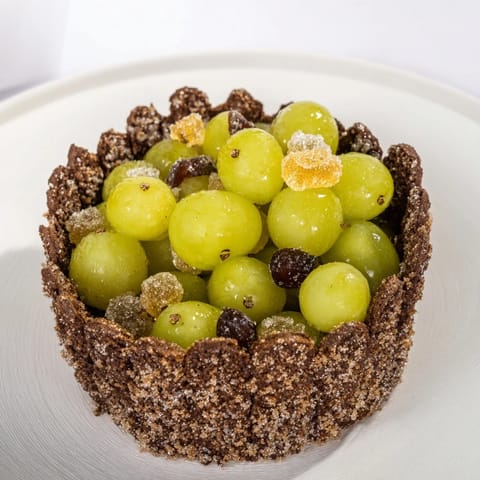 Inside the chocolate cracker "Crystal Cave," glittering sugared grapes and crunchy rock candy await.