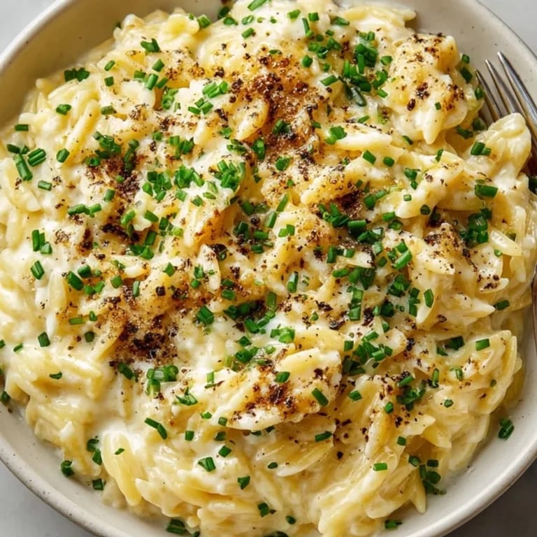 Close-up of silky Parmesan Truffle Orzo, a rich and comforting Italian-inspired side dish.