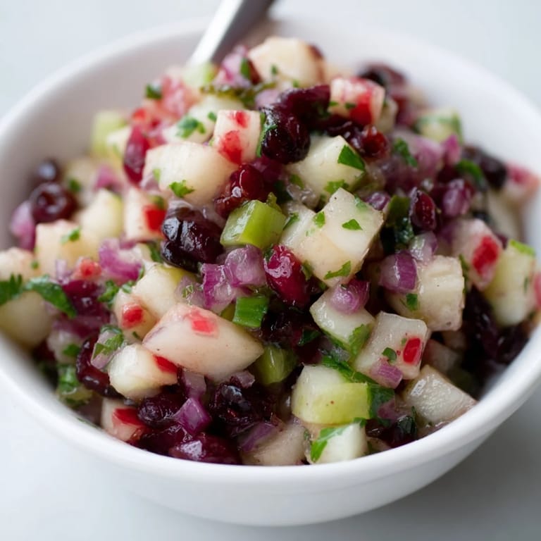 Zesty Pear and Cranberry Jalapeño Salsa with crunchy textures, perfect for summer gatherings.