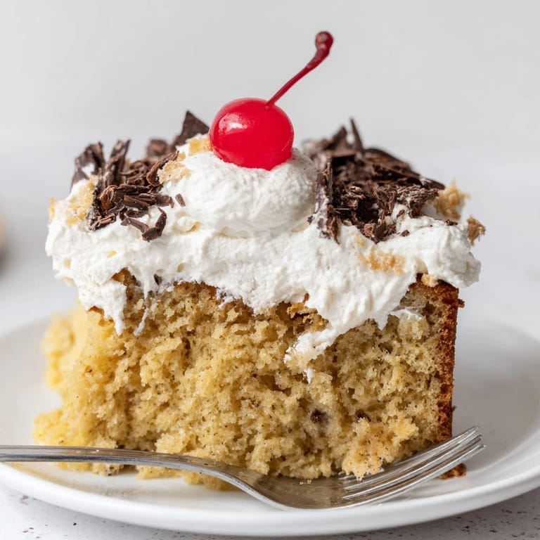 Decadent Rebel Float Banana Bread drizzled in frosty soda-inspired icing for dessert.  