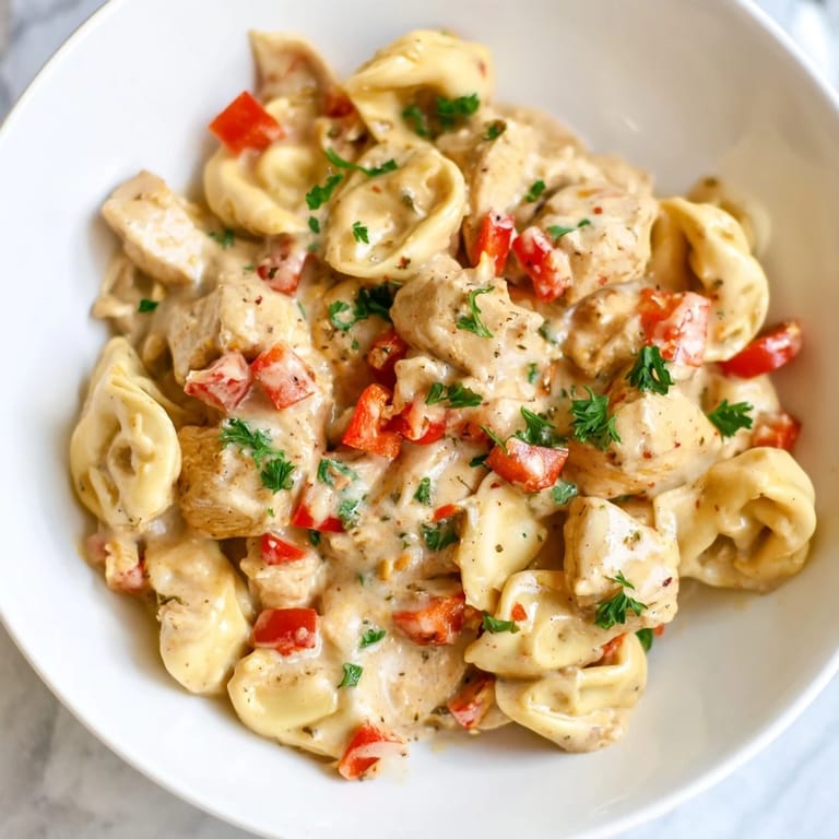 Savory Zesty Cajun Garlic Parmesan Chicken Tortellini served warm, perfect for a weeknight dinner.
