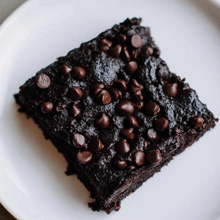 Warm, freshly baked Black Bean Brownies, rich and chocolatey, ready to serve and enjoy now.