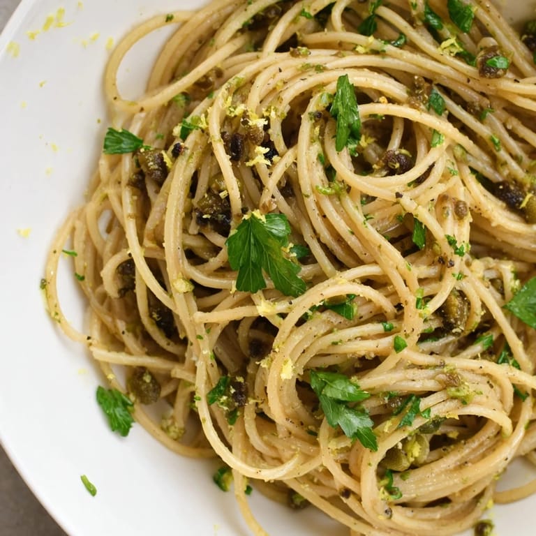 Mediterranean Olive Tapenade Pasta, a vegetarian delight with olives, capers, and tender pasta.