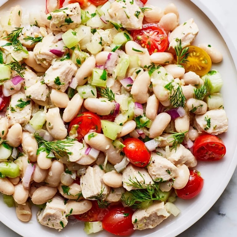 Bright and creamy Lemony White Bean Chicken Salad, ready for lunch with a lemon vinaigrette.